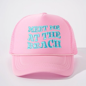 Pink mesh trucker hat with blue embroidery and rope detail on a light gray background