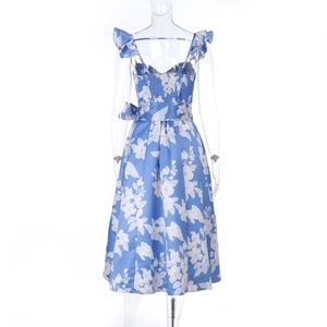 Detail of blue floral print dress with ruffle straps, elastic back, and waist tie design