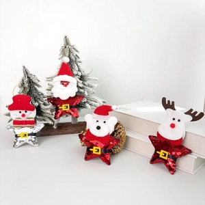 Detail of Christmas star ornaments featuring Santa, snowman, elk and bear with sequins