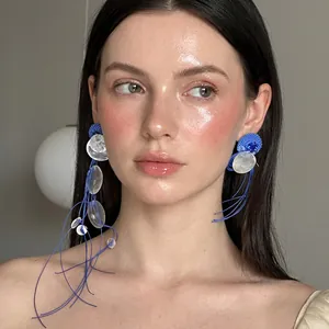 Elegant long blue shell tassel earrings featuring artistic silver sequin accents for women