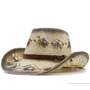 Détails du tissage évidé respirant et de la bande en cuir sur un chapeau de cowboy en paille