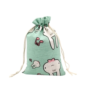 Green cotton drawstring bag with cute white bunny and pink music notes print