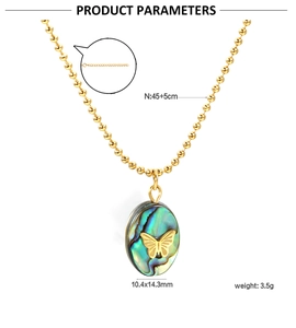 Detail view of golden butterfly necklace with shell texture and size parameters info