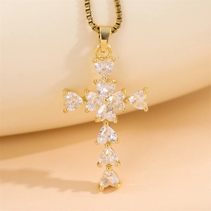 Chic gold cross pendant necklace featuring heart-shaped sparkling crystals for women