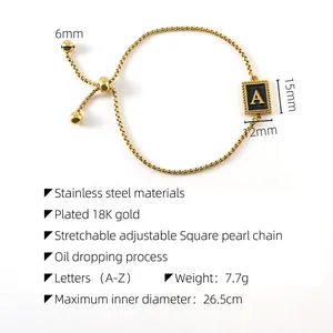 Detail showing adjustable 18K gold plated bracelet dimensions and black enamel A pendant