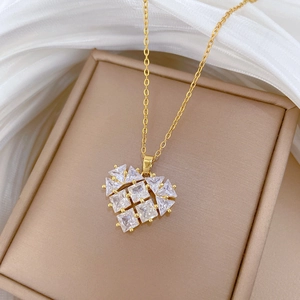 Luxurious gold titanium steel necklace with hollow heart pendant and sparkling zircon stones
