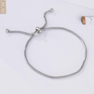 Adjustable silver snake chain bracelet with slider clasp and polished steel finish
