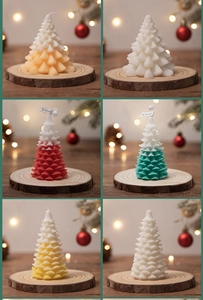 Detail grid of six scented Christmas tree candles in festive colors and gradients