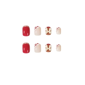 Pink leopard print press-on nails with 3D white bows and elegant pearl accents