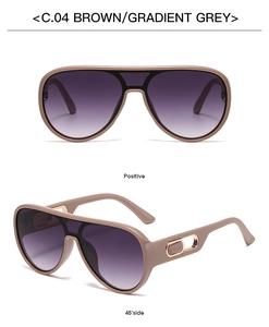 Macro detail of brown pilot sunglasses with gradient lenses and gold temple accents