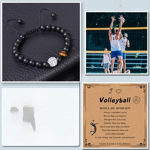Detail view of tiger eye bead bracelet with volleyball charm and inspirational card