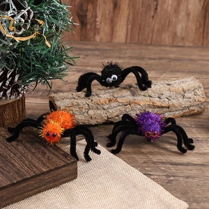 Set of three colorful Halloween spider hair clips with glitter fur balls and bendable legs