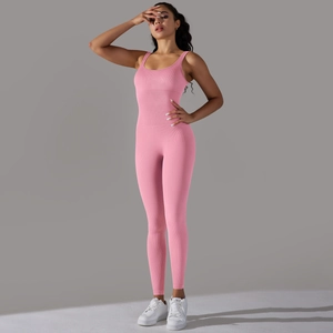 Close-up of pink ribbed seamless yoga jumpsuit with racerback and high elasticity
