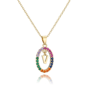 Macro detail of gold plated necklace featuring rainbow zircon oval pendant with letter V