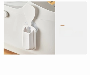 Detail of ABS rice cooker scoop holder with suction cup and smooth rounded edges