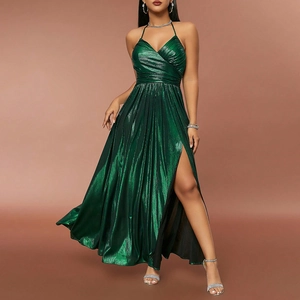 Close-up of deep green metallic maxi dress with pleated texture and high side slit detail