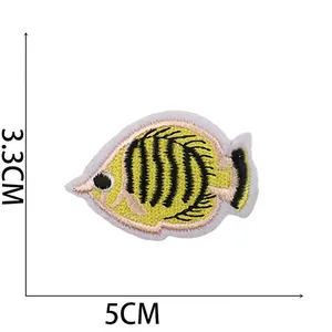 Detailed size view of yellow fish embroidery patch measuring 5cm x 3.3cm
