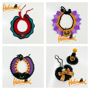 Detailed view of handmade crochet Halloween pet collars with pumpkin and spider patterns