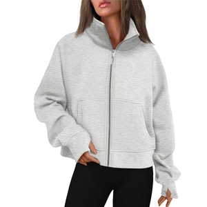 Women's light grey zip-up sweatshirt with high neck and thumbhole cuffs on white background