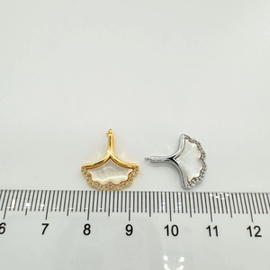 Size comparison of 15mm ginkgo leaf pendants with mother of pearl and small crystals