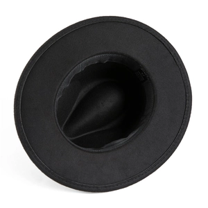 Detail view of the interior lining and stitching on this vintage black fedora hat