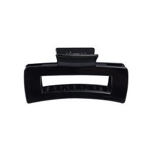 Detail of a large 10.5cm glossy black rectangular hair claw clip with strong spring