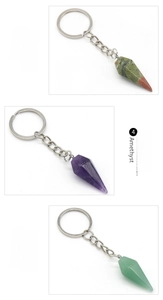 Detail of Unakite, Amethyst and Aventurine hexagonal crystal cone keychains with metal rings