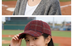 Close-up of burgundy wool plaid baseball cap with classic British vintage check pattern