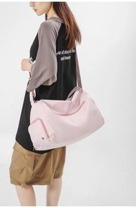 Sac de fitness rose imperméable avec bandoulière réglable et grande poche zippée latérale