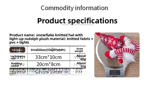 Detail of Christmas gnome with snowflake knit hat and warm LED light decoration