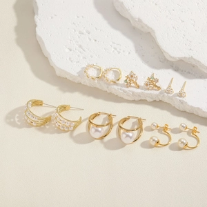 Elegant gold titanium steel and pearl geometric earrings set with zircon accents