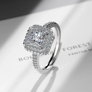 Elegant silver halo ring featuring a square center cubic zirconia with pave diamond band