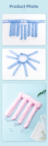 Detail of octopus-style heatless hair curlers with diamond stitching and velcro closure
