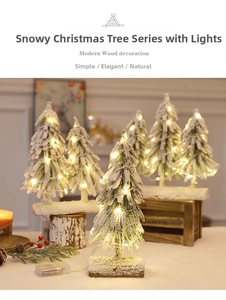 Snow-flocked mini Christmas trees with warm LED lights and natural wood bases