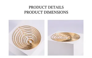 Detailed view of polished gold hoop earrings in various sizes on white display cubes