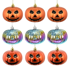 Set of 9 Halloween pumpkin ornaments in orange and iridescent finishes on white background