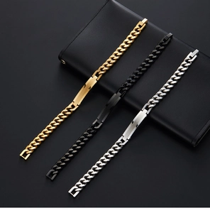 Cuban link bracelets in gold, black, and silver steel with rectangular metal id plates