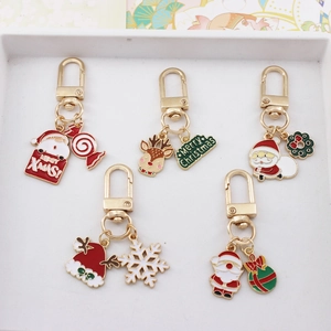 Lot de 5 porte-clés de Noël avec pendentifs Père Noël et renne en métal doré