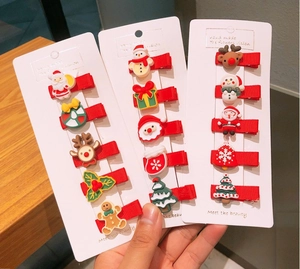Detailed set of 15 Christmas themed resin hair clips with festive holiday characters