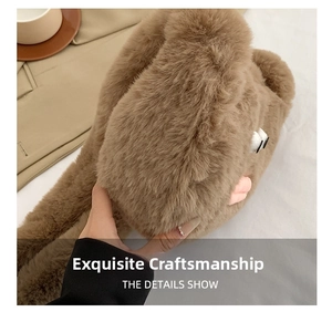 Close-up of the soft brown plush material and cute cartoon eye details of the bag
