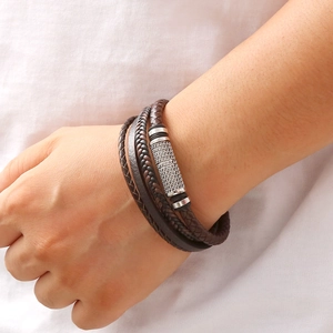 Men's multi-layer braided brown leather bracelet with silver magnetic buckle on wrist