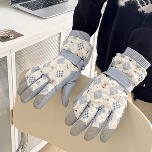 Women's blue quilted teddy bear ski gloves with warm plush lining and touchscreen design