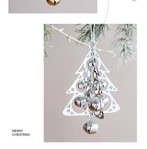 Detail view of silver metal hollow Christmas tree ornament with multiple hanging bells