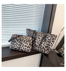 Close-up of leopard print tote bag set with large capacity and matching small pouch