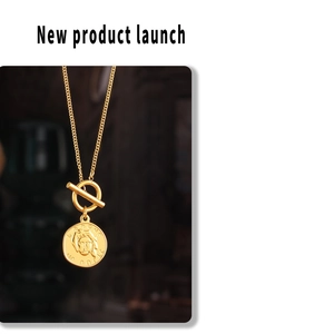 Detail of 18k gold plated OT toggle clasp and irregular portrait pendant necklace