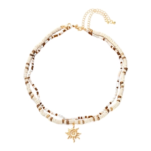 Double-layered beaded necklace with golden sun pendant and adjustable lobster clasp