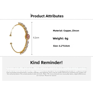 Detailed view of a gold-plated copper bracelet featuring pink oval zircon stones and measurements