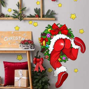 Sticker mural Père Noël rigolo dans une couronne de Noël pour décoration festive maison