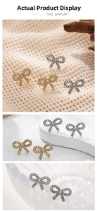 Detail of bow-shaped stud earrings featuring full rhinestone inlay in gold and silver