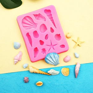 Pink starfish and seashell silicone mold for ocean theme fondant cake decorations